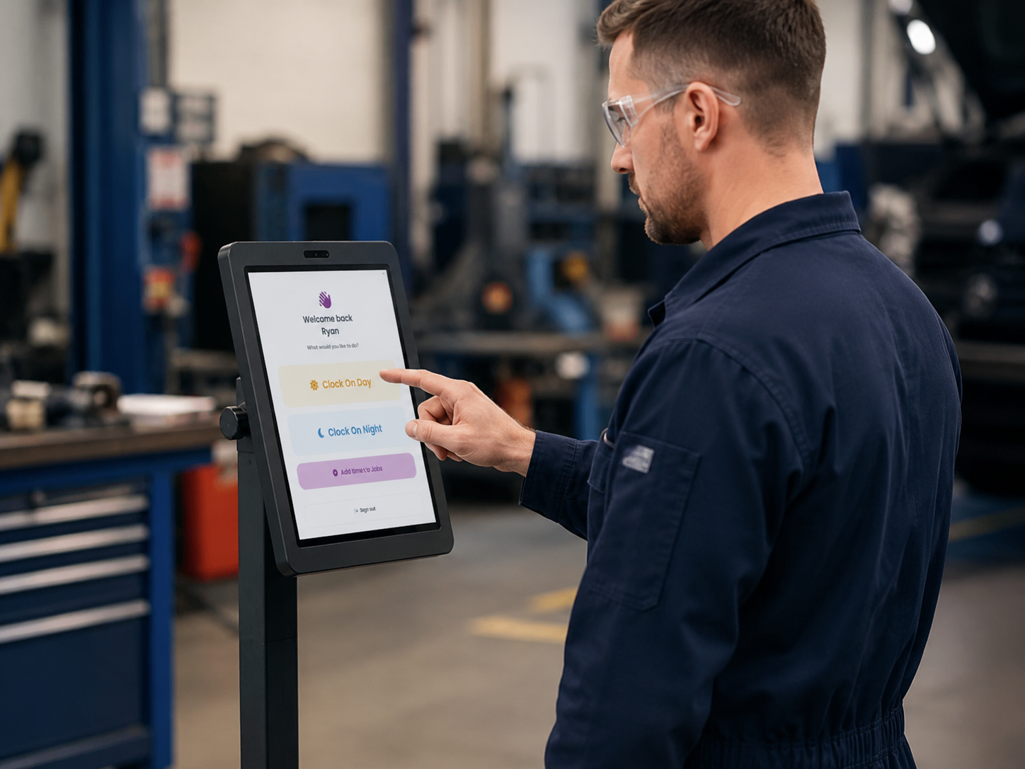 SprintSuite workshop kiosk on an iPad mounted in a heavy equipment workshop