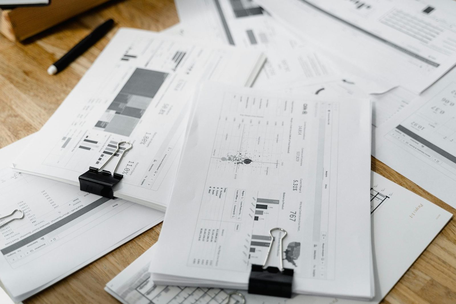 Payroll documents and compliance paperwork on office desk