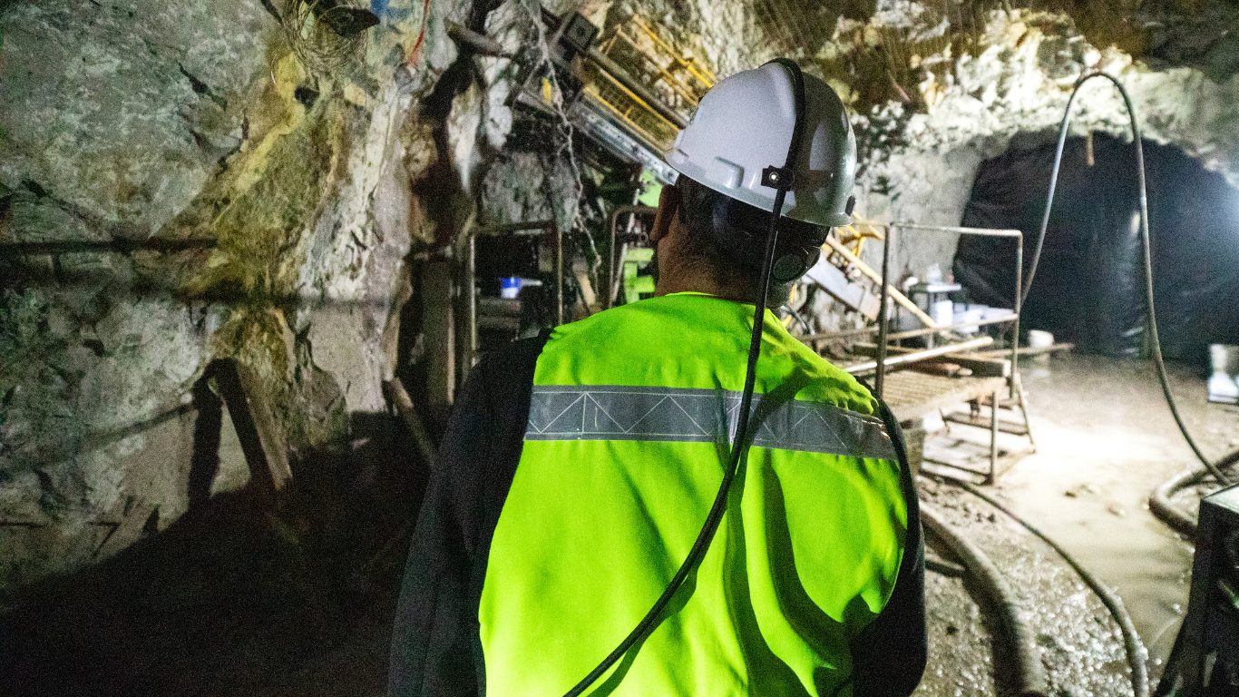 Mining crew conducting toolbox safety meeting at Australian mine site